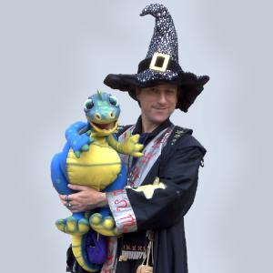 Wizard with dragon puppet