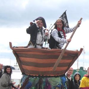 Pirates in a boat street theatre act