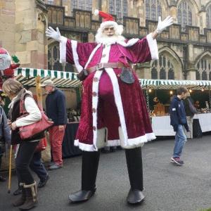 Giant stiltwalking Santa Claus