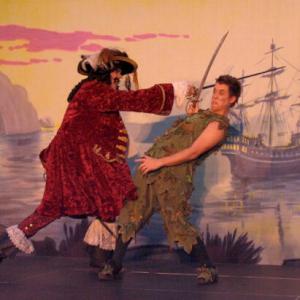 Peter pan and Captain Hook in sword fight