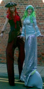 Pirate and mermaid stilt walking duo. Please quote caal17.