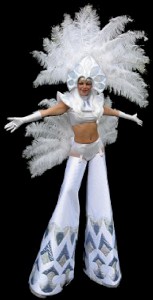 White costumed stilt walking showgirl. Please quote here9.