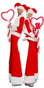 Christmas style stilt walkers. Please quote trpe1.